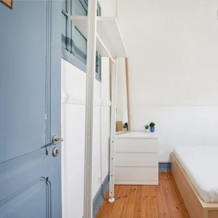 Rent this 4 bed room on Rua dos Heróis de Quionga 51 in 1170-179 Lisbon, Portugal
