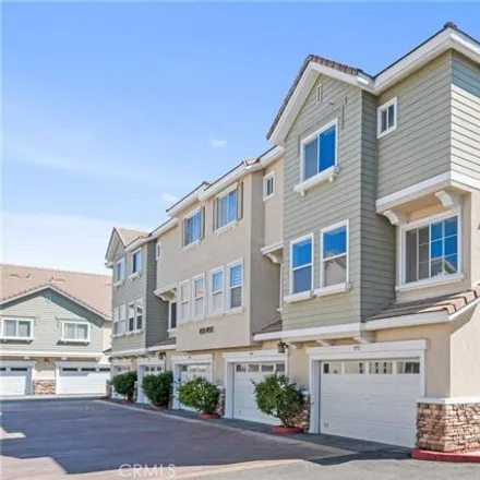 Buy this 2 bed townhouse on 4828 Aquamarine Way in Cypress, CA 90630