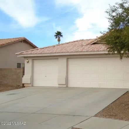 Rent this 4 bed house on 919 North Siverleaf Oak Place in Tucson, AZ 85710