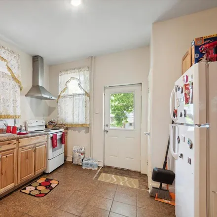 Rent this 4 bed townhouse on 6156 Webster Street in Philadelphia, PA 19143