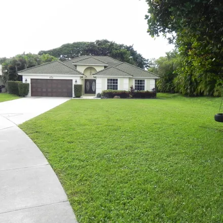 Rent this 4 bed house on 10725 Paso Fino Drive in Palm Beach County, FL 33449