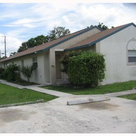 Rent this 3 bed duplex on 236 Palmetto Drive in Lake Park, Palm Beach County