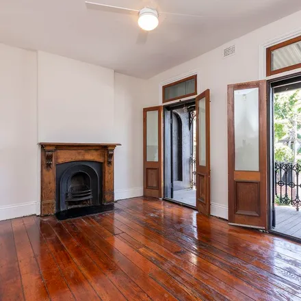 Rent this 4 bed apartment on Redfern Mosque in Cleveland Street, Surry Hills NSW 2010