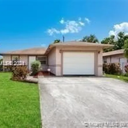 Rent this 3 bed house on 683 Northwest 28th Avenue in Washington Park, Broward County