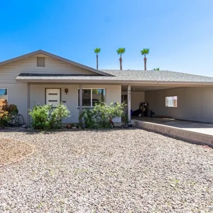 Buy this 3 bed house on 5421 West Saguaro Drive in Glendale, AZ 85304