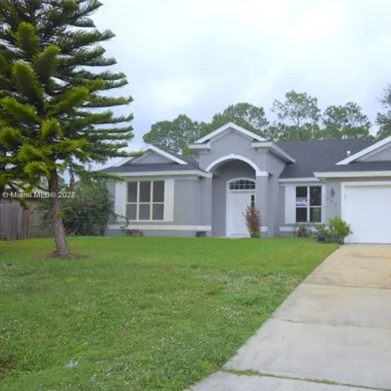 Buy this 4 bed house on 147 Brantley Street Southeast in Palm Bay, FL 32909