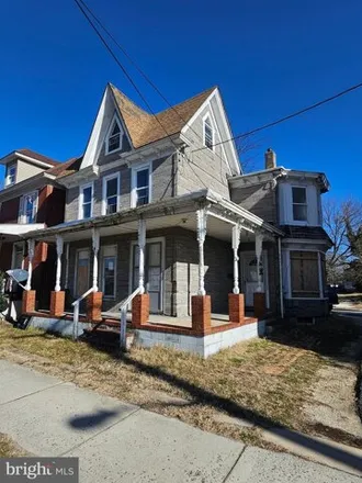 Buy this 4 bed house on 145 South 2nd Street in Roosevelt Park, Millville