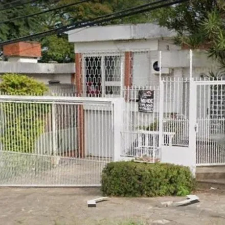 Buy this 3 bed house on ônibus TV in Rua Corrêa Lima, Santa Tereza