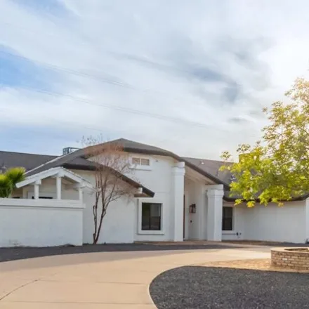 Buy this 4 bed house on 6427 West Wethersfield Road in Glendale, AZ 85304