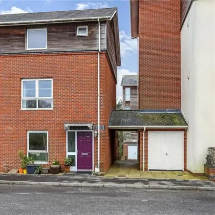 Buy this 4 bed townhouse on Osborne School in Athelstan Road, Winchester