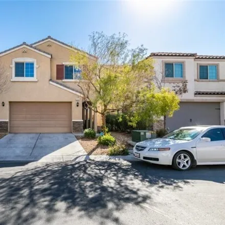 Rent this 4 bed house on 6884 Majestic Palm Drive in Whitney, NV 89122