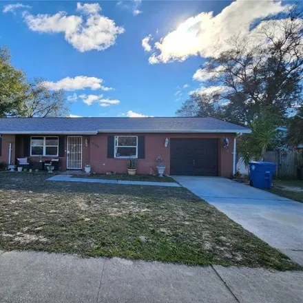 Buy this 3 bed house on 12328 Elgin Boulevard in Spring Hill, FL 34609