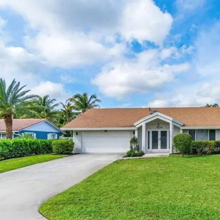 Rent this 4 bed house on 4573 Ellwood Drive in Franwood Pines, Palm Beach County