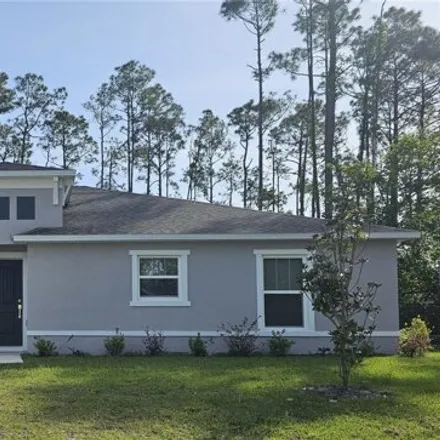 Rent this 4 bed house on 99 Peninsula Lane in Palm Coast, FL 32164