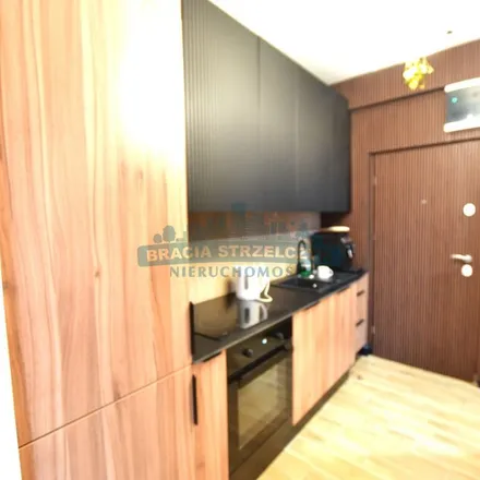 Rent this 2 bed apartment on PKO BP in Marszałkowska 124, 00-008 Warsaw