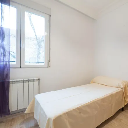 Rent this 3 bed room on Madrid in Calle del Cerro Bermejo, 28011 Madrid