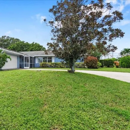 Buy this 4 bed house on 4365 Magnolia Street in North Palm Beach, FL 33418