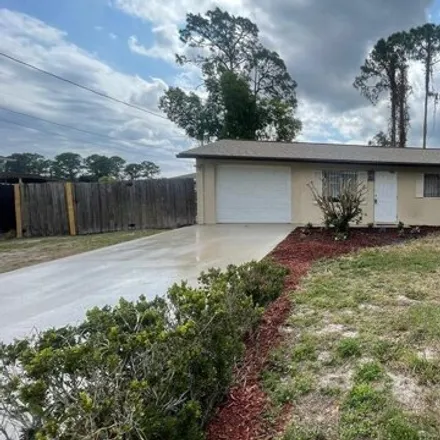 Buy this 3 bed house on 221 Felix Avenue North in Lehigh Acres, FL 33971