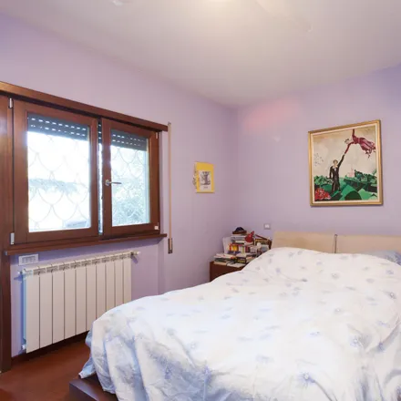 Rent this 4 bed room on Via Michelangelo Tilli in 00158 Rome RM, Italy