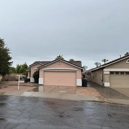 Rent this 3 bed house on 1006 South Slater Circle in Mesa, AZ 85206