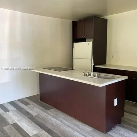 Rent this 3 bed apartment on 56 Northwest 60th Street in Edison Center, Miami
