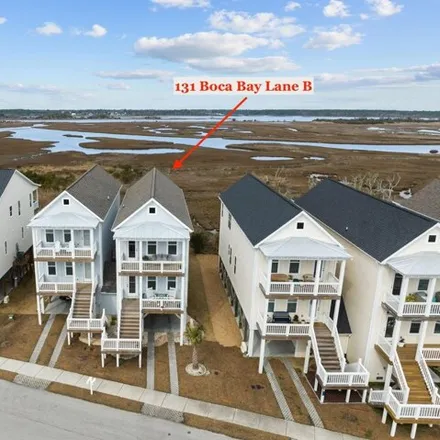 Buy this 4 bed house on North Boca Bay in Surf City, NC 28445
