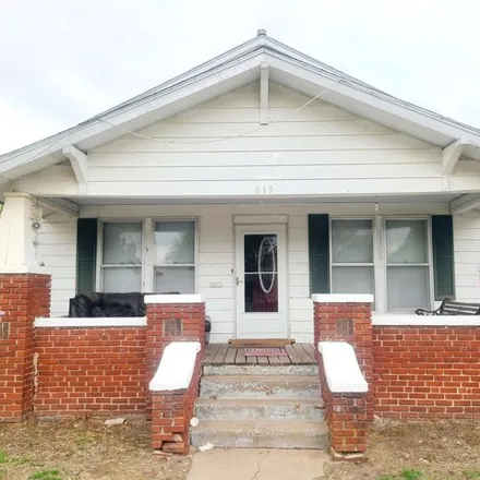 Buy this 4 bed house on 655 East Maple Avenue in Enid, OK 73701