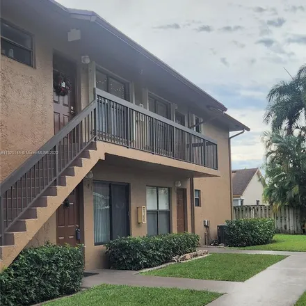 Rent this 2 bed apartment on 10084 Winding Lakes Road in Sunrise, FL 33351