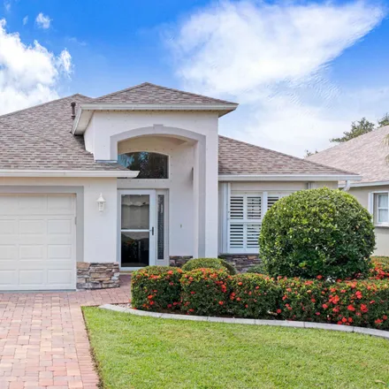 Buy this 3 bed house on 1320 Lago Mar Drive in Viera, FL 32940