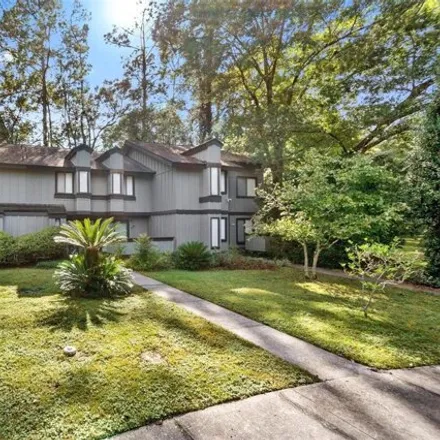 Buy this 4 bed house on 2492 Forest Way in Gainesville, Florida