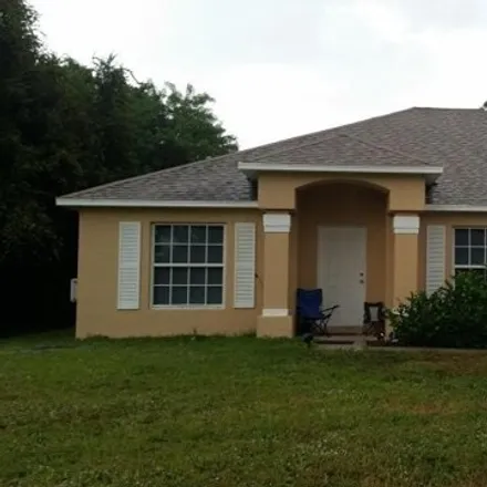 Rent this 3 bed house on 2555 Southwest Barber Lane in Port Saint Lucie, FL 34984