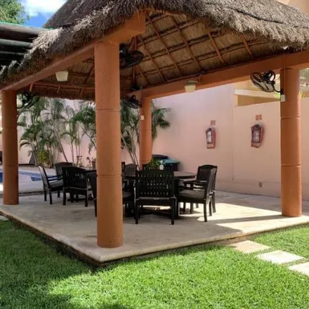 Rent this 4 bed house on Calle Paseo de la Araucaria in 77506 Cancún, ROO