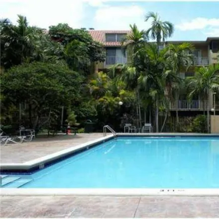 Rent this 2 bed condo on 6904 North Kendall Drive