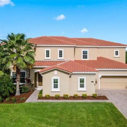Buy this 5 bed house on 16189 Johns Lake Overlook Drive in Winter Garden, FL 34787