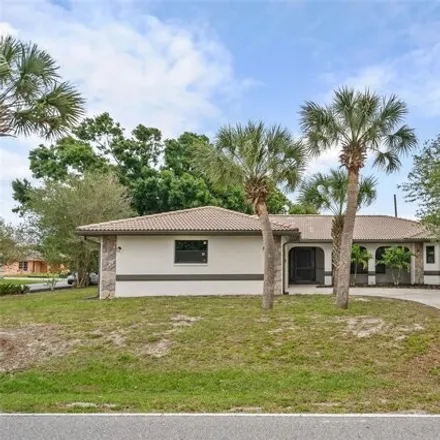 Buy this 5 bed house on 23117 McCandles Avenue in Port Charlotte, FL 33980
