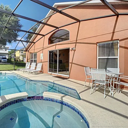 Rent this 4 bed apartment on 8649 la Isla Drive in Osceola County, FL 34747