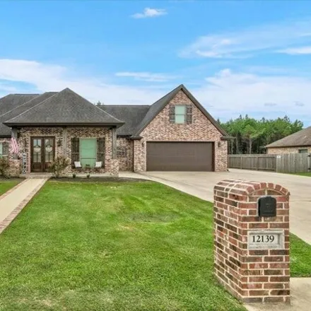 Buy this 4 bed house on 12127 Sam Rayburn Boulevard in Orange County, TX 77630