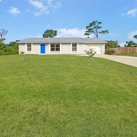 Buy this 3 bed house on 466 Millport Street Northwest in Port Charlotte, FL 33948