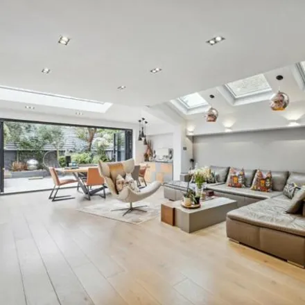 Buy this 5 bed townhouse on Ballingdon Road in London, SW11 6AZ