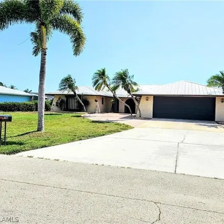 Buy this 3 bed house on 6177 Plumosa Ave in Fort Myers, Florida