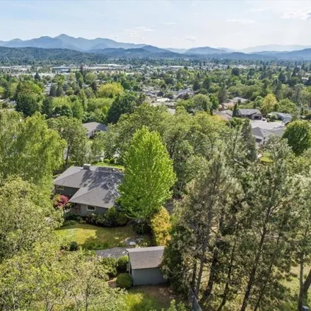 Buy this 3 bed house on 1420 Northeast Heritage Drive in Grants Pass, OR 97526