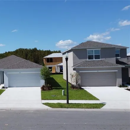 Rent this 3 bed house on Pine Tree Bridge Trail in Saint Cloud, FL 34772