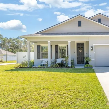 Buy this 4 bed house on 1 Smokewick Court in Palm Coast, FL 32164