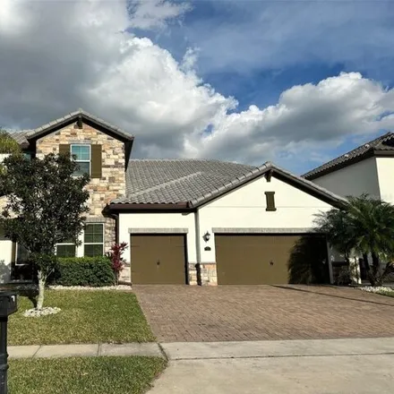 Rent this 5 bed house on 7936 Chilton Drive in Dr. Phillips, Orange County