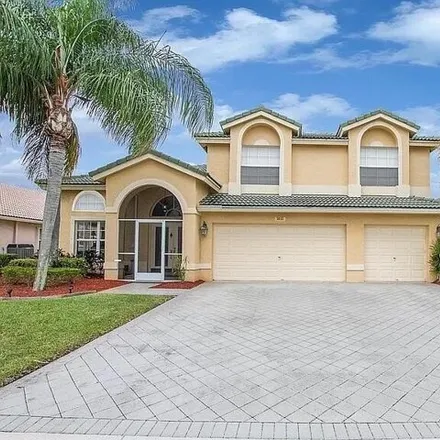 Rent this 4 bed house on 3633 Moon Bay Circle in Wellington, FL 33414