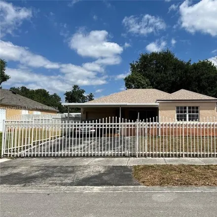Buy this 3 bed house on 3605 Northwest 202nd Street in Riviera Mobile Park, Miami Gardens