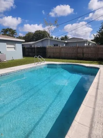 Rent this 3 bed house on 4347 Northwest 35th Avenue in Lauderdale Lakes, FL 33309