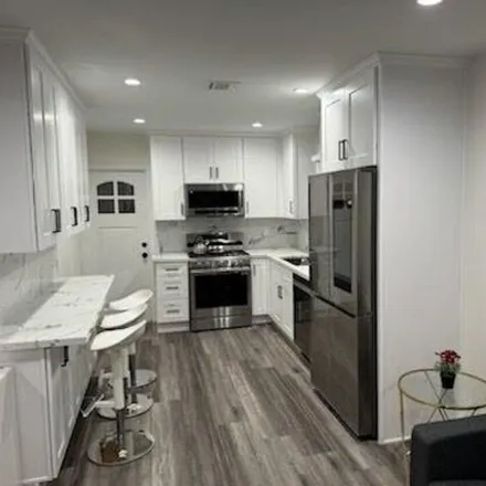 Rent this 2 bed house on 5542 Harold Way in Los Angeles, California
