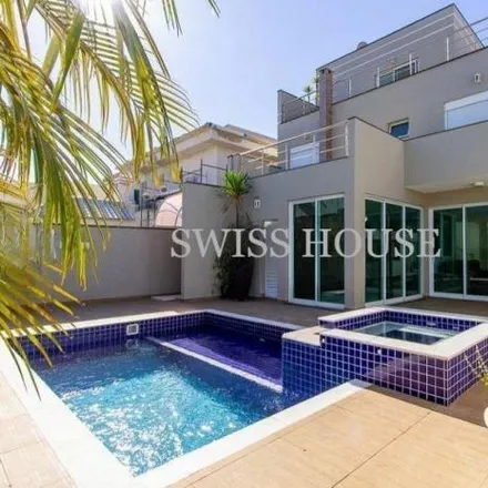 Rent this 4 bed house on Avenida Maria Marozini Moura in Swiss Park, Campinas - SP