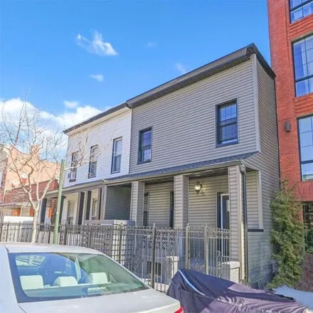 Buy this 4 bed house on 927 Rogers Avenue in New York, NY 11226